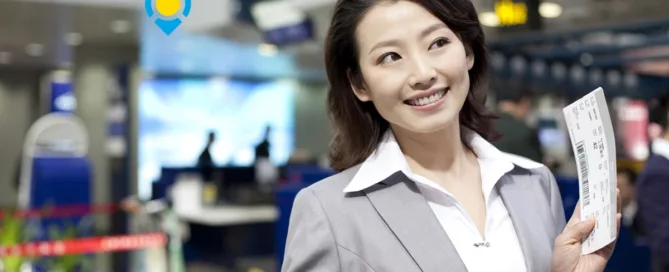 Travel Agent Handing Plane Tickets