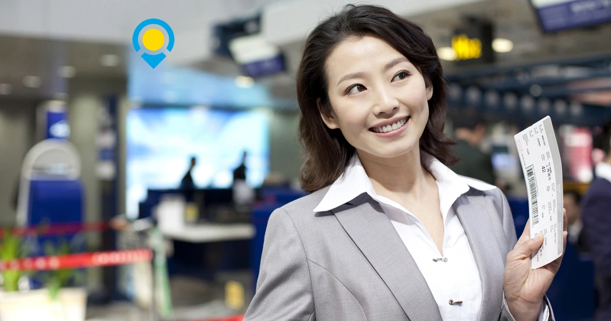 Travel Agent Handing Plane Tickets