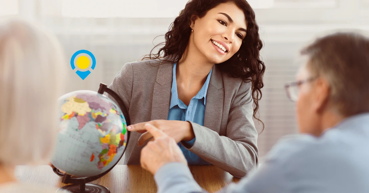 Travel Agent Showing Destinations on a Globe